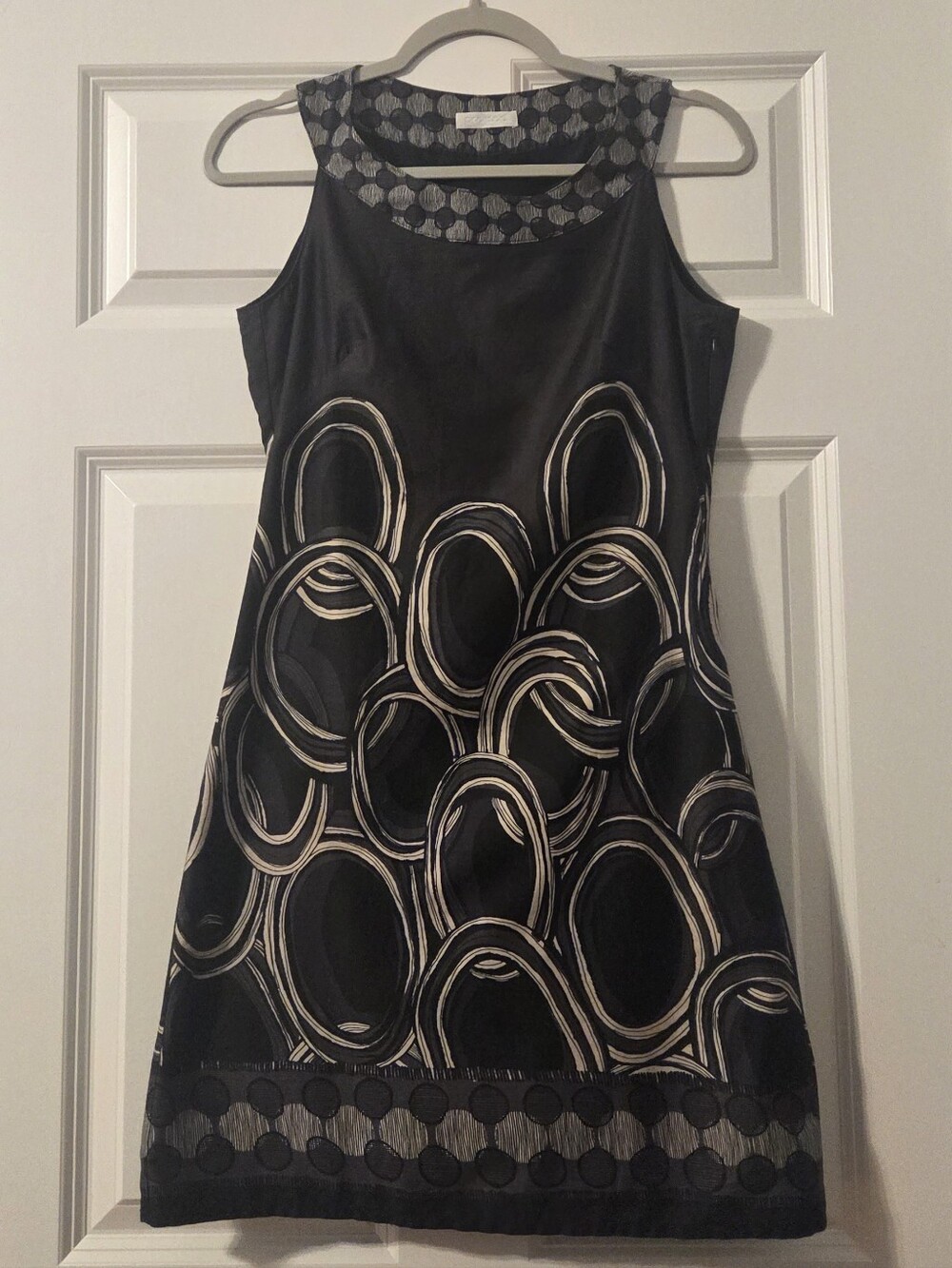 Promod Black Sleeveless Dress with Decorative Neckline and Abstract Trim